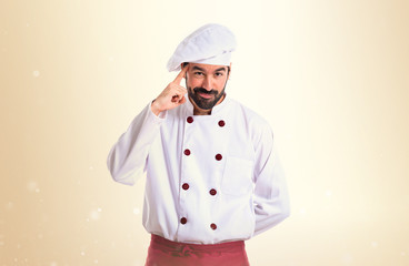 Chef thinking over white background