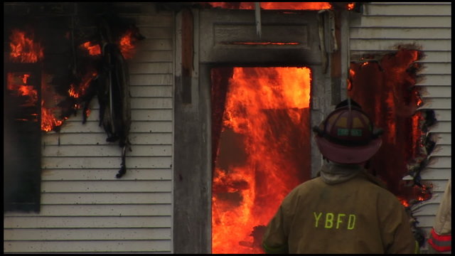 A home is completely destroyed by fire.