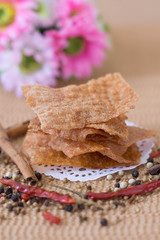 Sliced sheets of dried and crispy pork