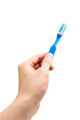 hand holding old toothbrush
