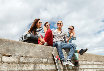 group of smiling teenagers hanging out