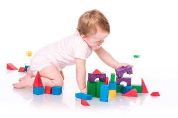 Beautiful baby building with cubes
