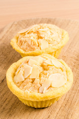 Almonds tart on wooden board