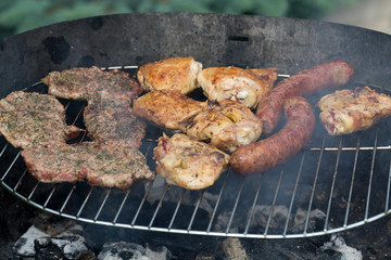 barbecue with delicious grilled meat on grill