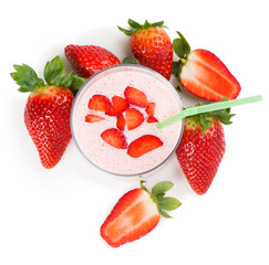 strawberry smoothie in a glass and berries , top view