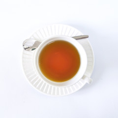 The white cup tea on the white background