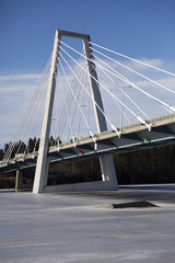 Fototapeta na wymiar Bridge over Frozen River in Sweden