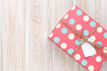 Vintage gift box over white wooden table