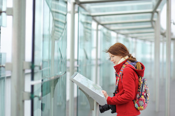 Young beautiful woman on observation deck