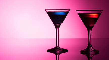 Colorful cocktails on reflective top