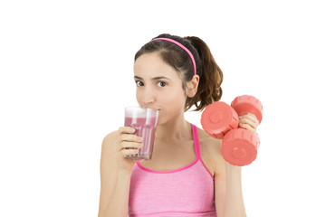 Sporty woman drinking smoothie