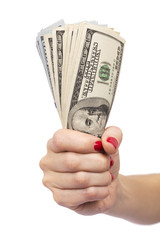 woman hand holding bundle of dollars isolated over white