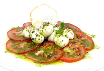 appetizer with tomatoes and cheese in a restaurant