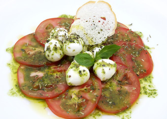 appetizer with tomatoes and cheese in a restaurant