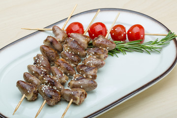 Grilled chicken hearts barbecue