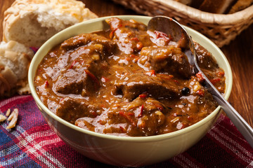 Beef stew served with crusty bread