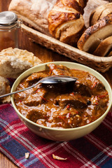 Beef stew served with crusty bread