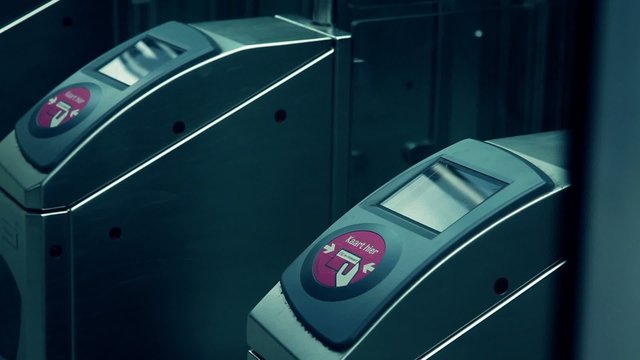 Close up of Commuter touching transport card on reader