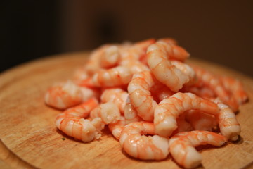 Cooked Shrimp on Top of Wooden Cutting Board