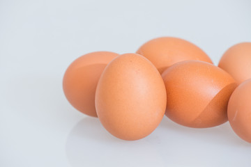 fresh egg and broken eggs isolated on white background
