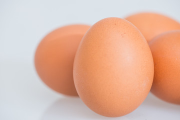 fresh egg and broken eggs isolated on white background