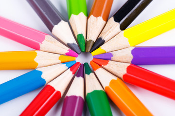 Fototapeta premium Colorful wooden pencils in the circle isolated on white
