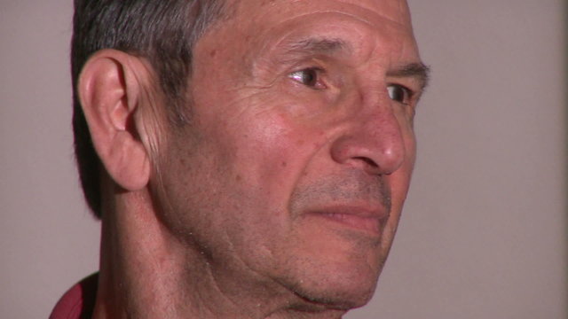 Close up shot of a male in his 60