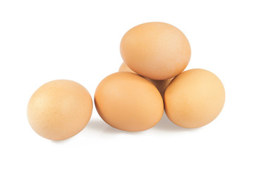 Five chicken eggs on a white background