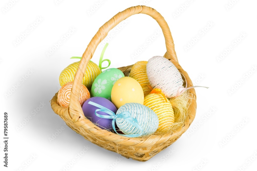 Sticker Bright easter eggs with bows in basket, isolated on white