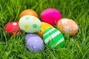 Colorful Easter eggs decorated in the grass