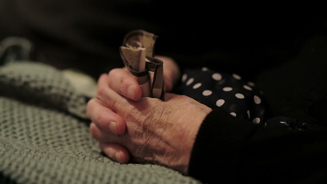 Hands of the old woman