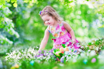Little girl at egg hunt
