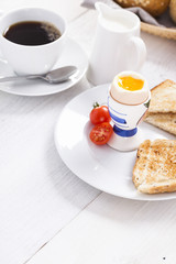 English breakfast on white wooden table