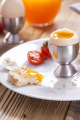 English breakfast on dark wooden table