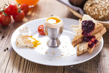 English breakfast on dark wooden table