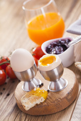English breakfast on dark wooden table