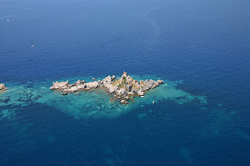 aerial view of the island with a chapel