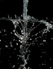 spray water on a black background