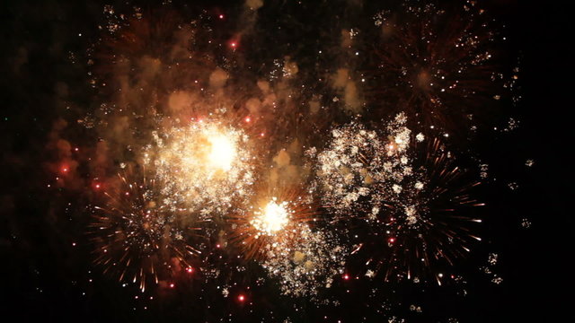 Slow mo. Beautiful Fireworks Exploding On Black Background.