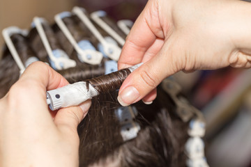 Permanent hair in a beauty salon