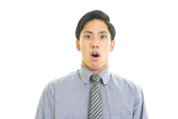 驚いた表情のビジネスマン