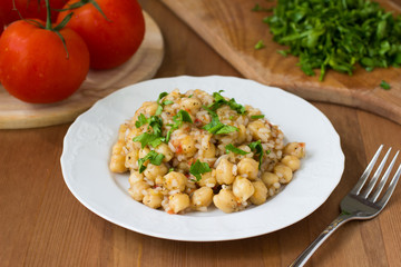 Chickpeas with rice and tomato sauce. Healthy vegan food
