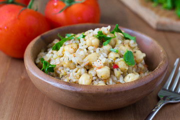 Chickpeas with rice and tomato sauce. Healthy vegan food