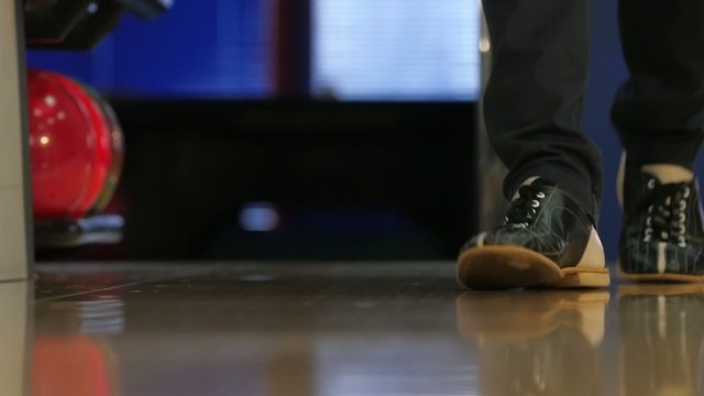 Special leather boots for bowling on feet. Slow motion