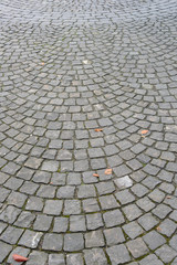 Pavement of granite with fish scale pattern