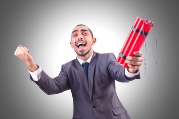Businessman with dynamite isolated on white