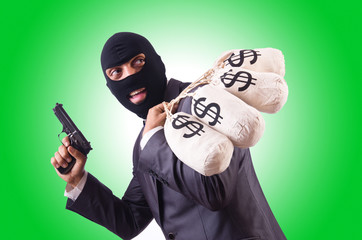 Gangster with bags of money on white