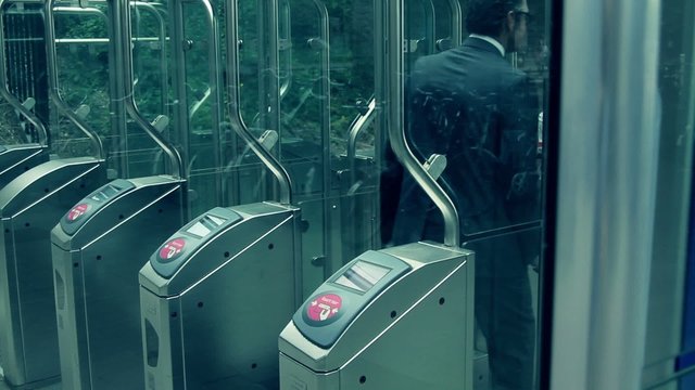 Timelapse of Commuter touching transport card on reader