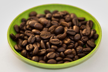 Coffee Beans in Green Dish