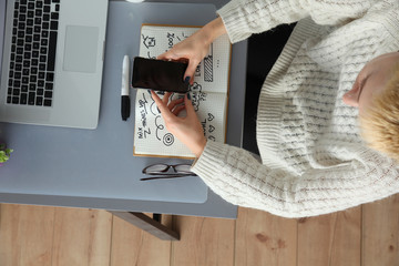 Businesswoman working on paperwork.